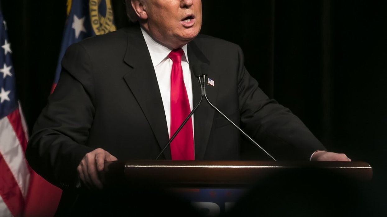 Donald Trump speaking at lectern