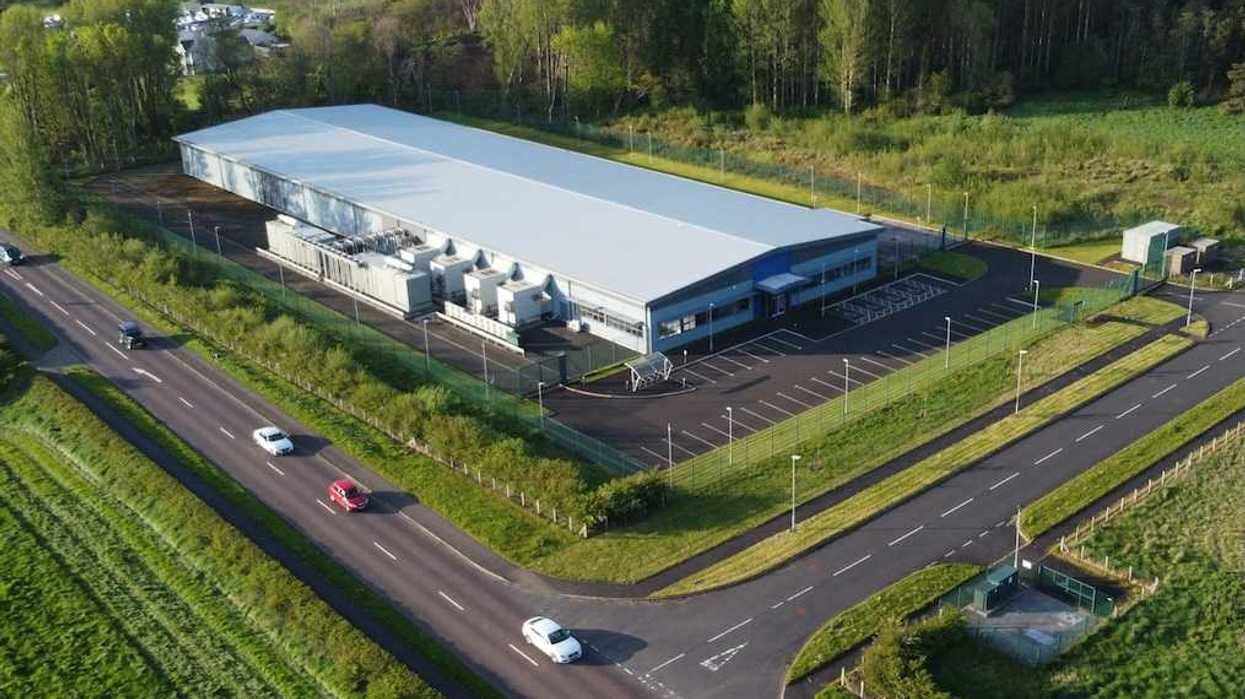 Drones-eye view of a data center sited in rural farm country