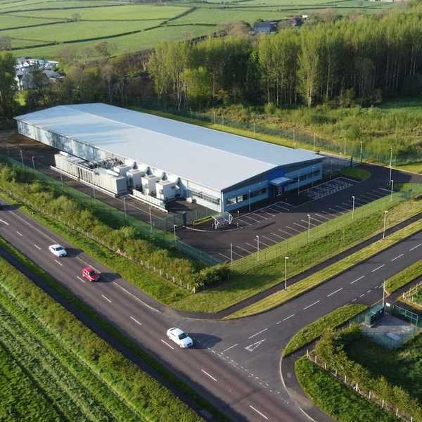 Drones-eye view of a data center sited in rural farm country
