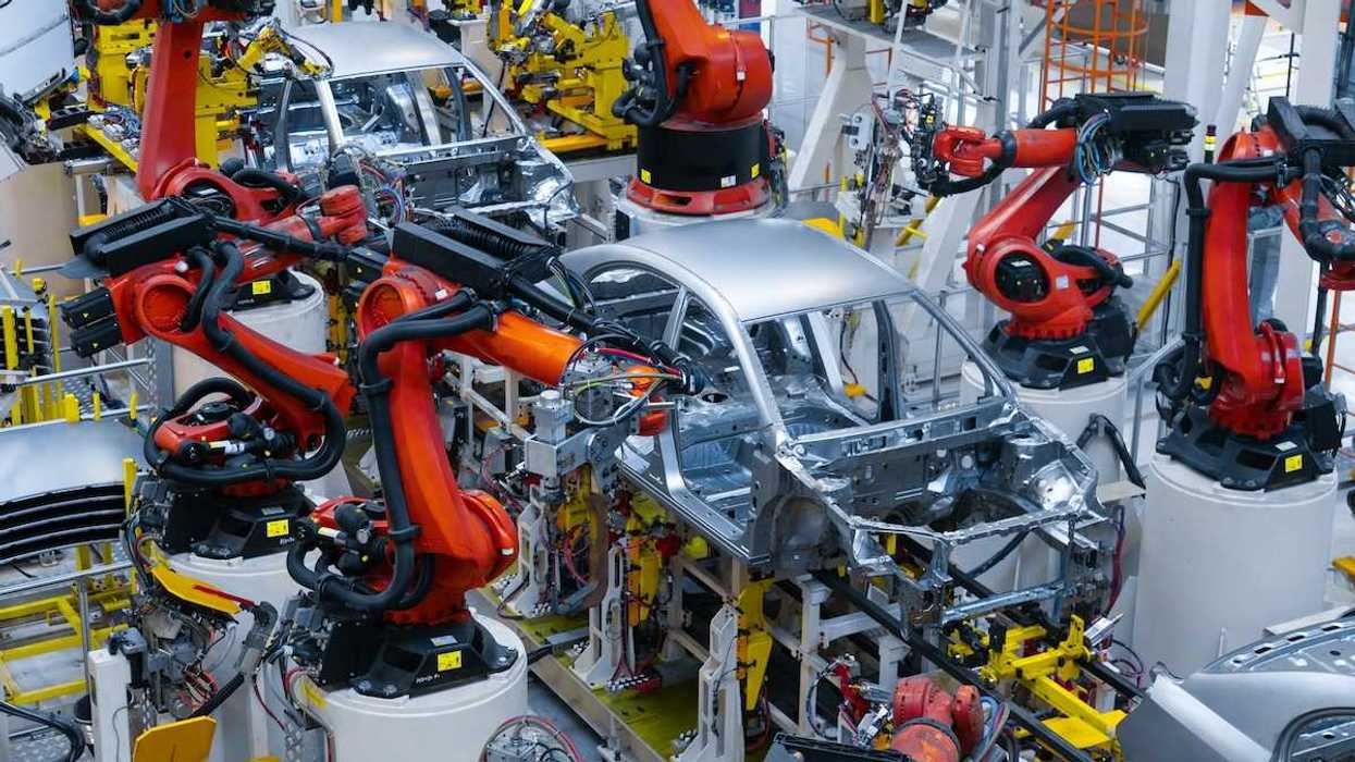 Electric vehicle robotic assembley line
