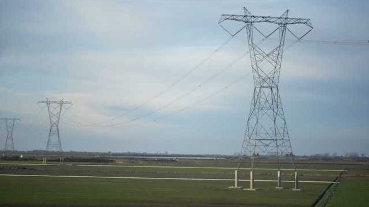 Electricity towers stretching into the distance