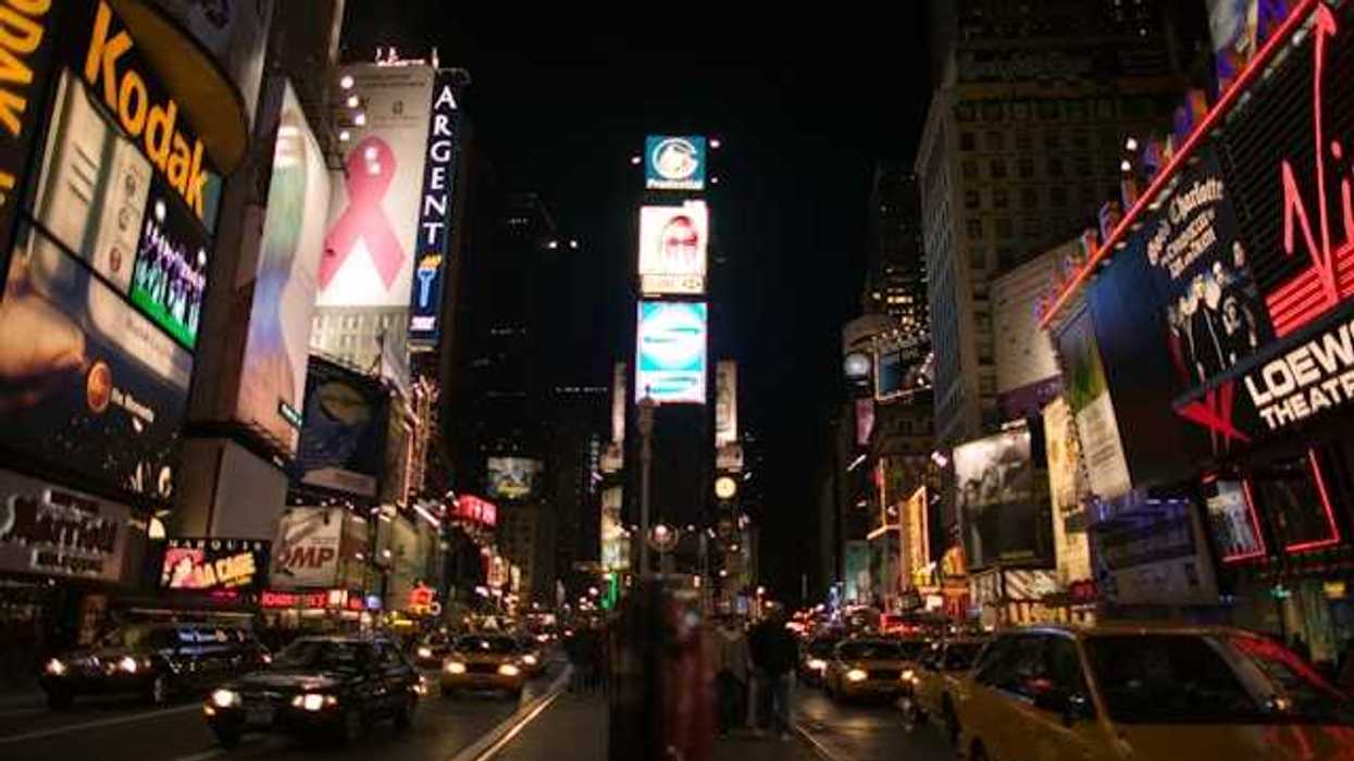 Electronic billboards on tall buildings in the center of a city