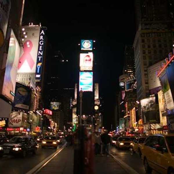 Electronic billboards on tall buildings in the center of a city