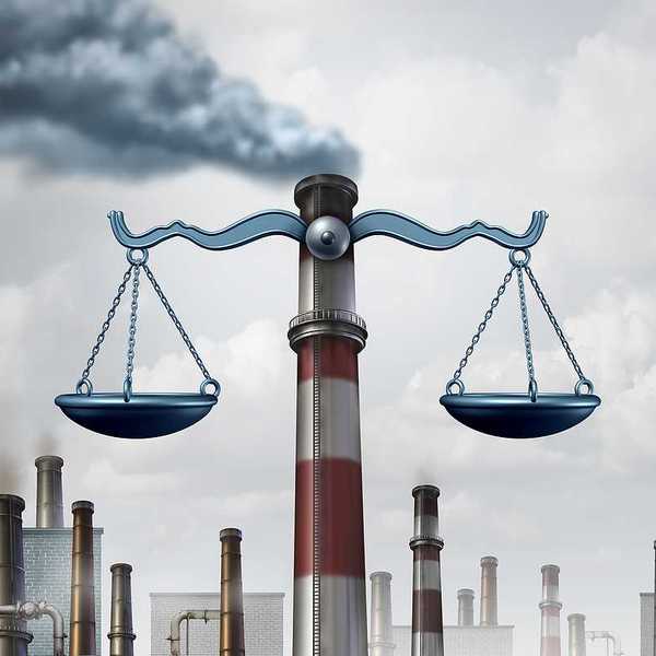 Environmental law symbol as an industrial smoke stack shaped as a justice scale as a metaphor for pollution regulations and clean air legislation.