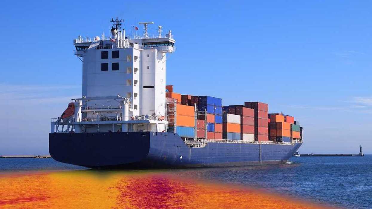 Environmental pollution caused by oil spill from the ship. Oil slick radiating outward from a container ship.