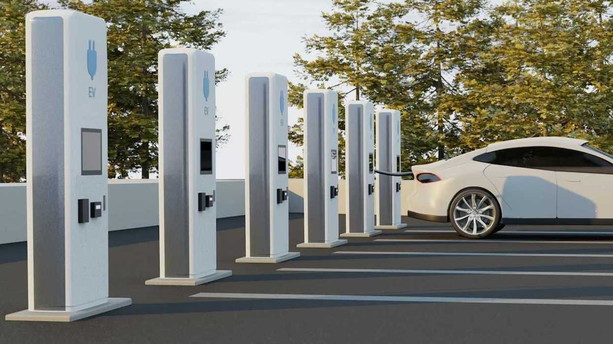 EV charging stations with one car being charged and five unused stations