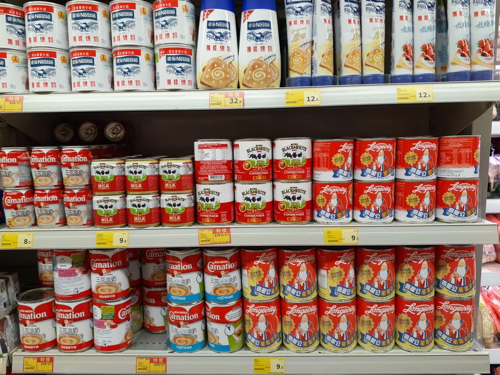 evaporated milk condensed milk supermarket shelf