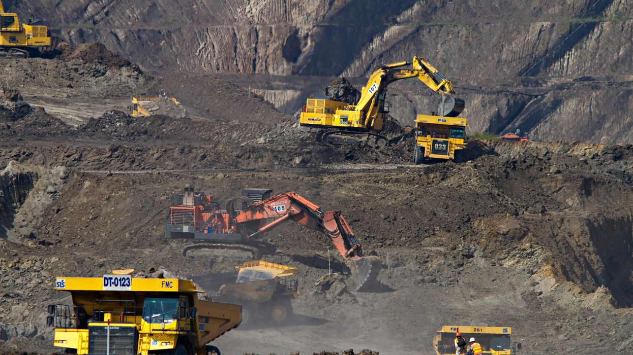 Excavators at coal mining area.