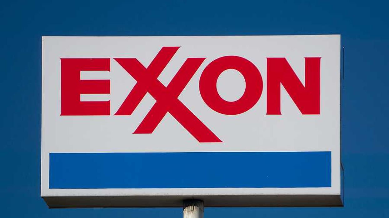 EXXON sign against blue-sky background