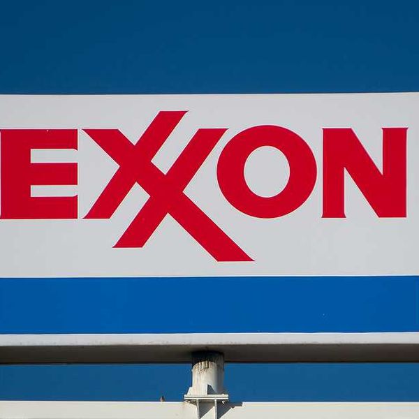EXXON sign against blue-sky background