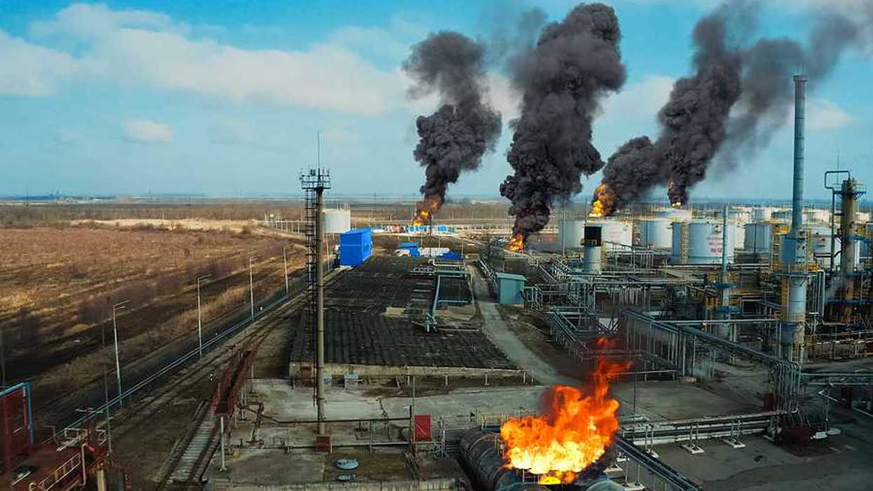 Fire at a refinery. Flames and smoke of fire.