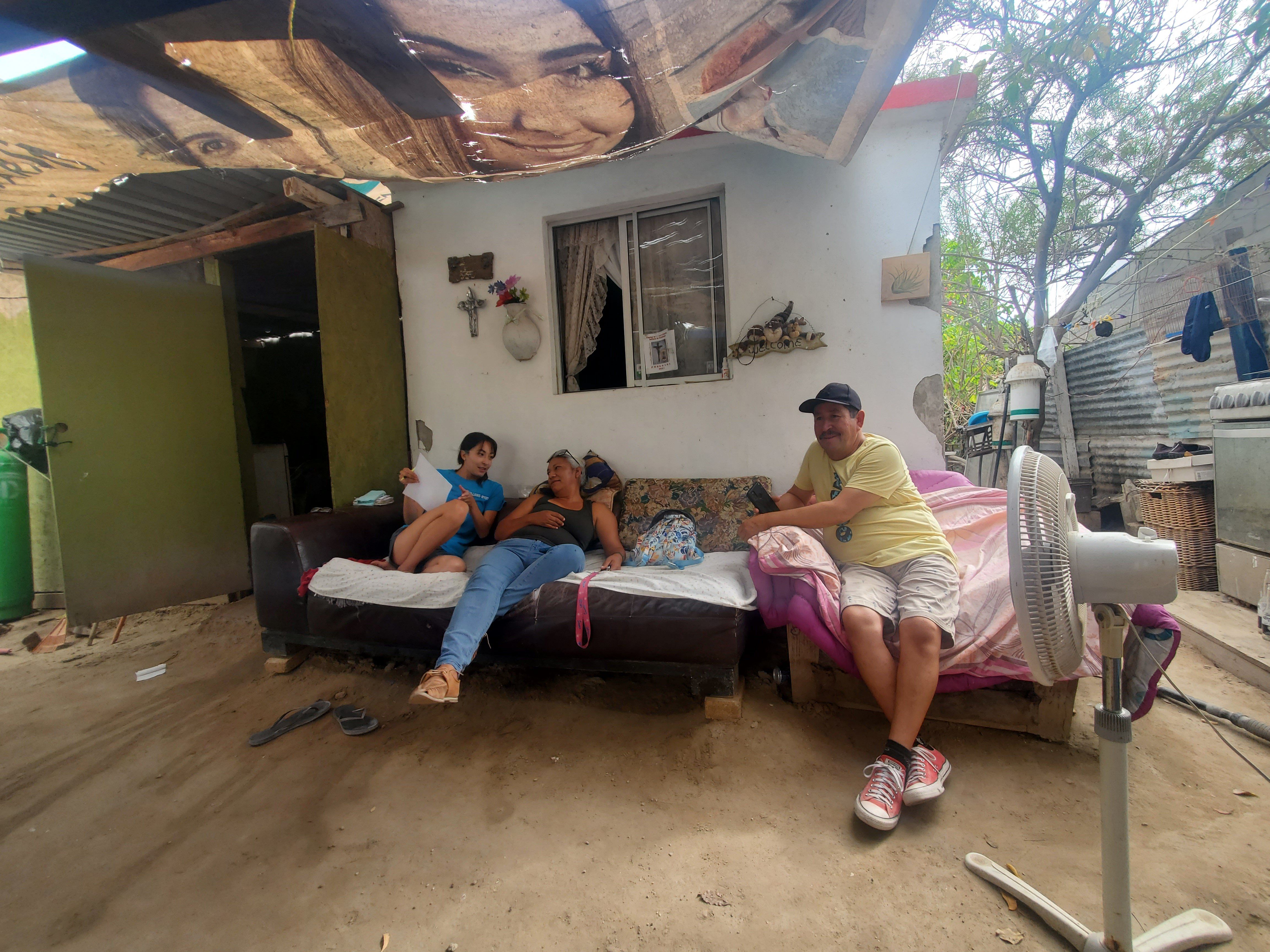 Fishers being interview on a couch