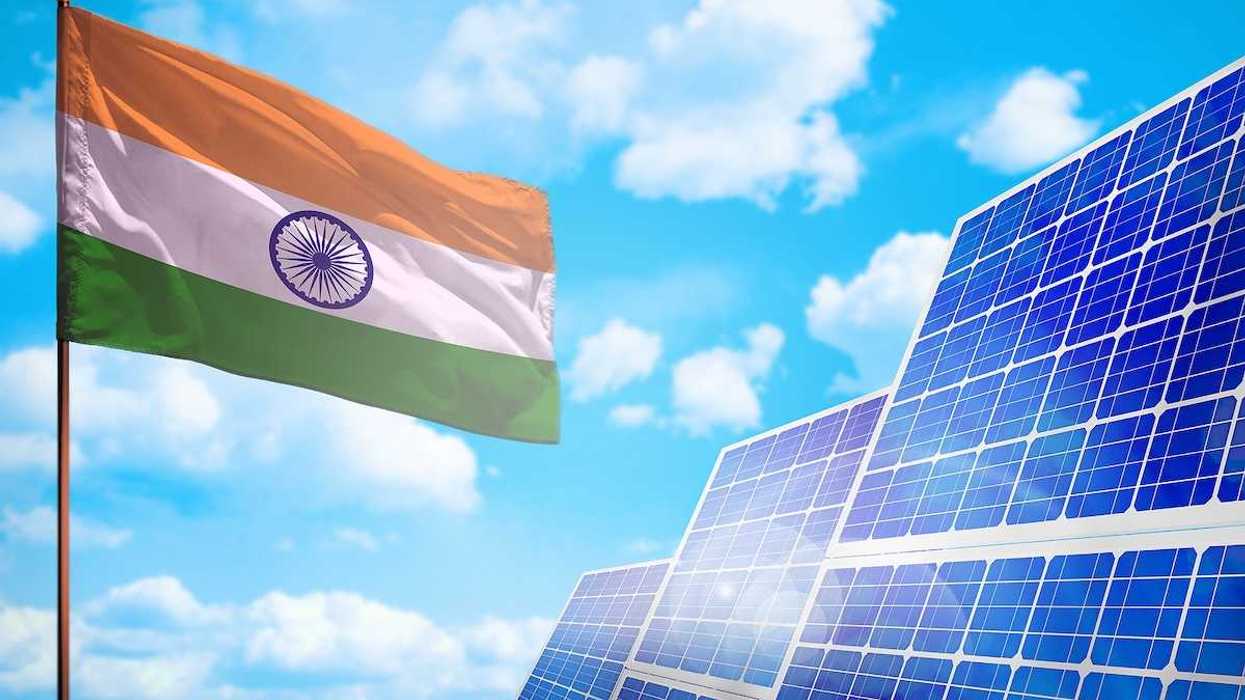 Flag of India juxtaposed with solar panels