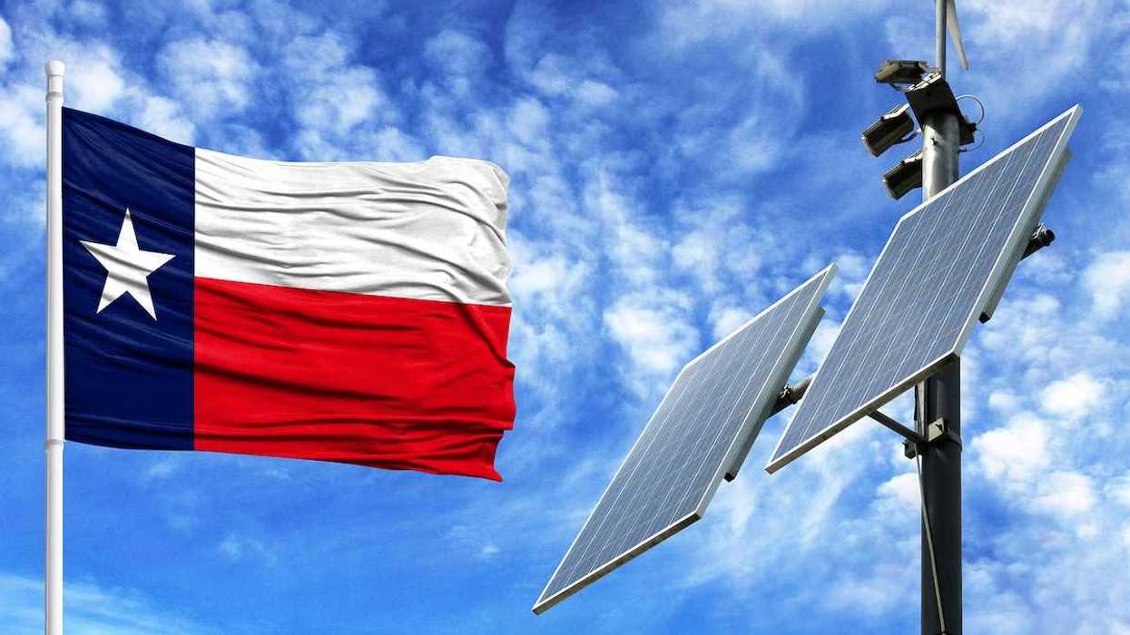 Flag of Texas adjacent to solar panels