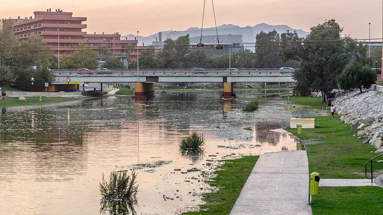 Flooded banks of a river in Spain after a storm