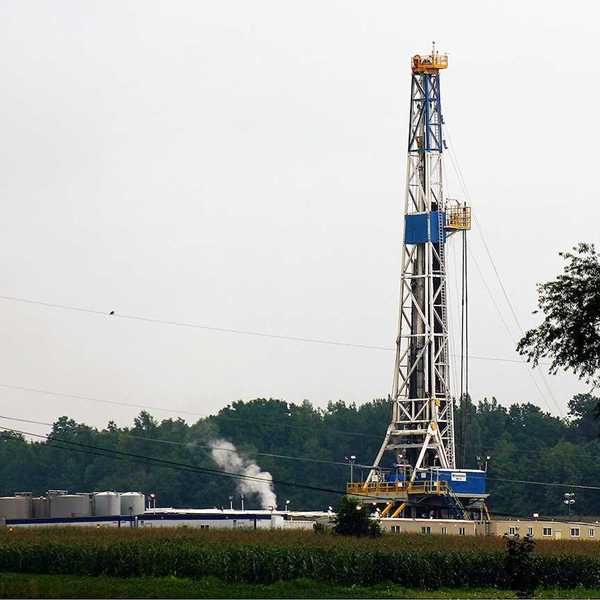 Fracking well - drilling rig, storage tanks and temporary structures
