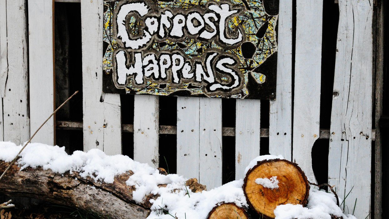 Garden sign that says compost happens