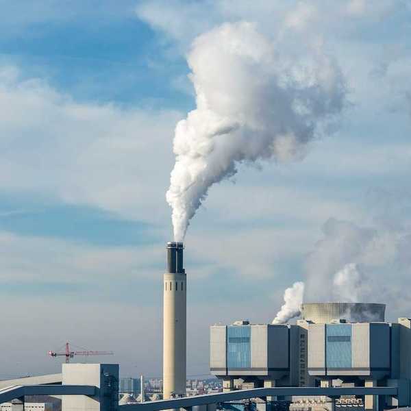 Gas-fired power plant in Berlin, smokestack emitting smoke