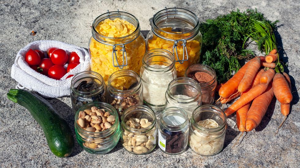 Glass jars of nuts and vegetables