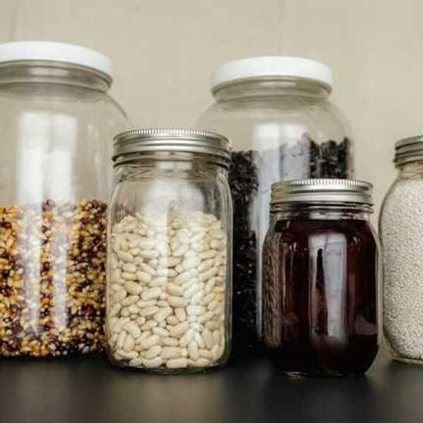 Glass jars storing grains and beans