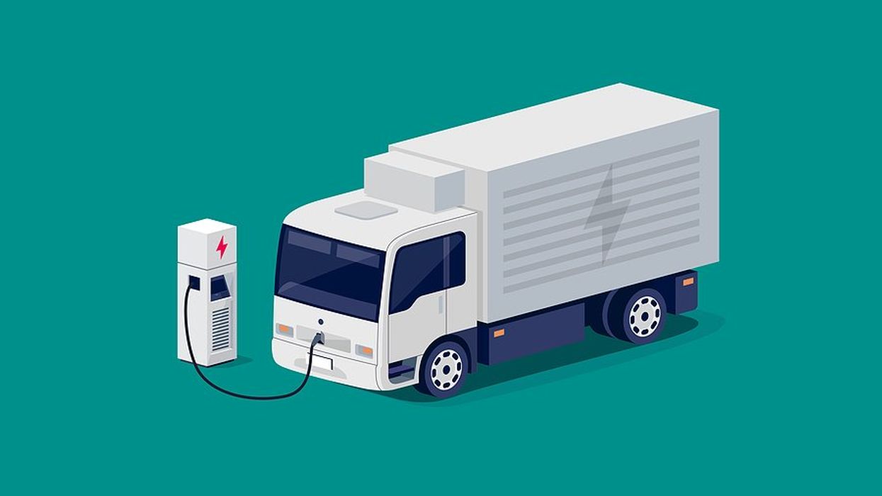 Graphic image of white freight truck being charged.