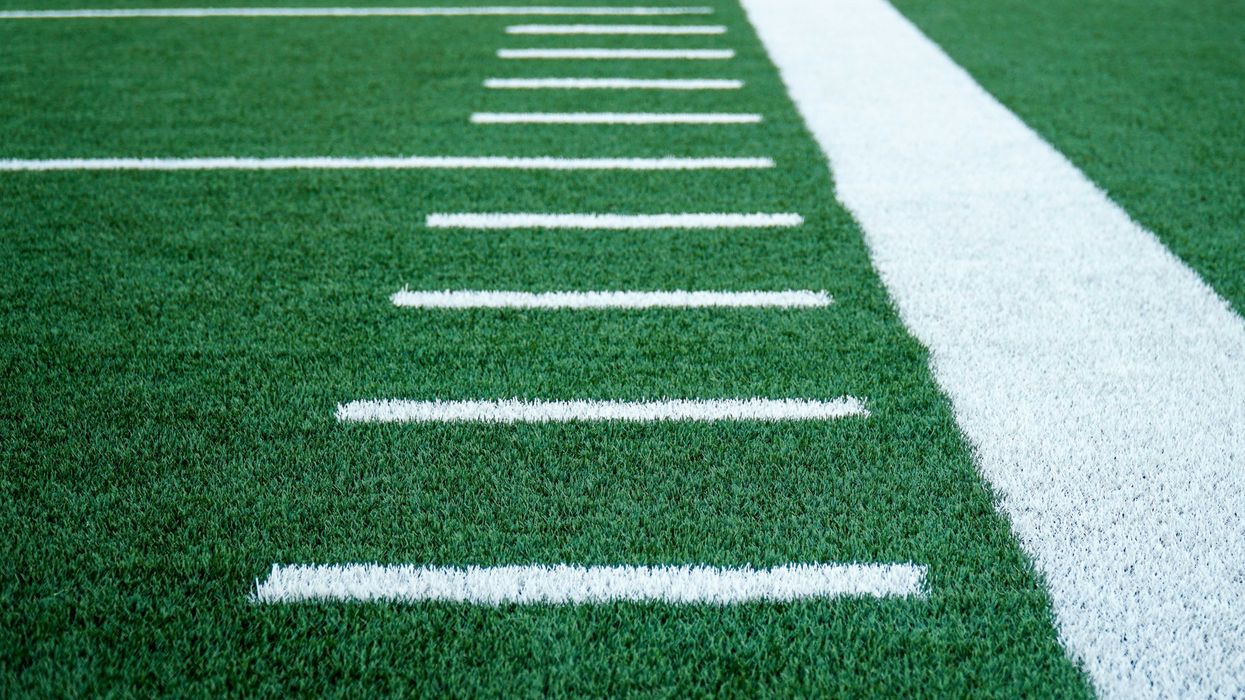 green and white stripes on artificial turf