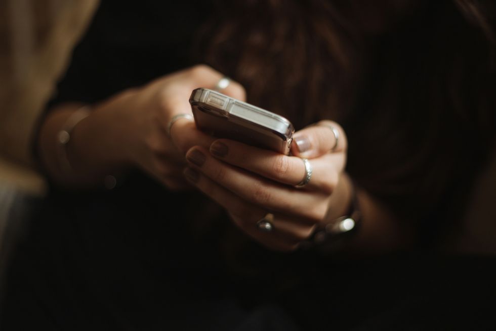 hands using smartphone
