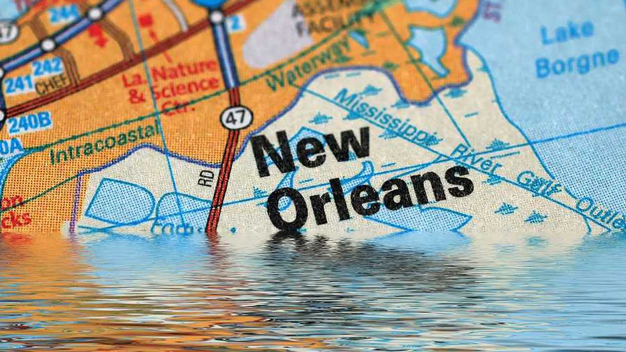 Highway map segment of New Orleans partially submerged in water