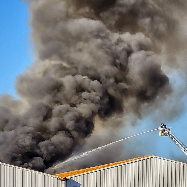 huge plume of black smoke