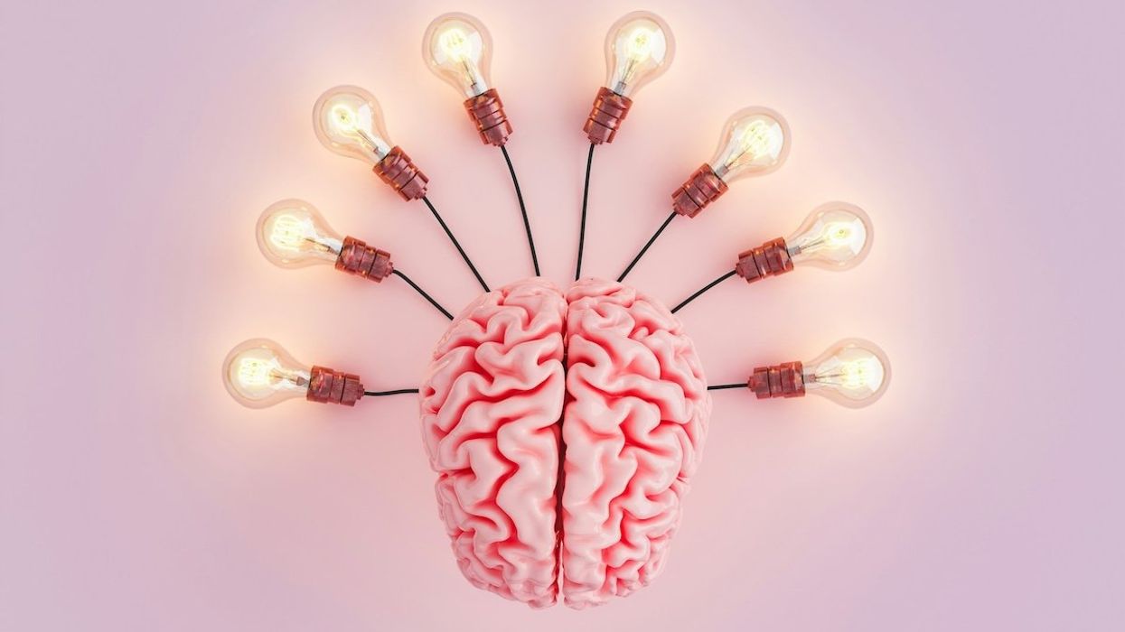 Human brain depicted connected to eight lightbulbs.