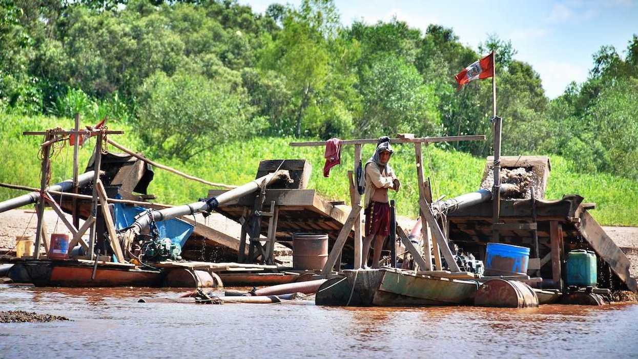 Illegal gold mining operation on the Madre de Dios river in Peru