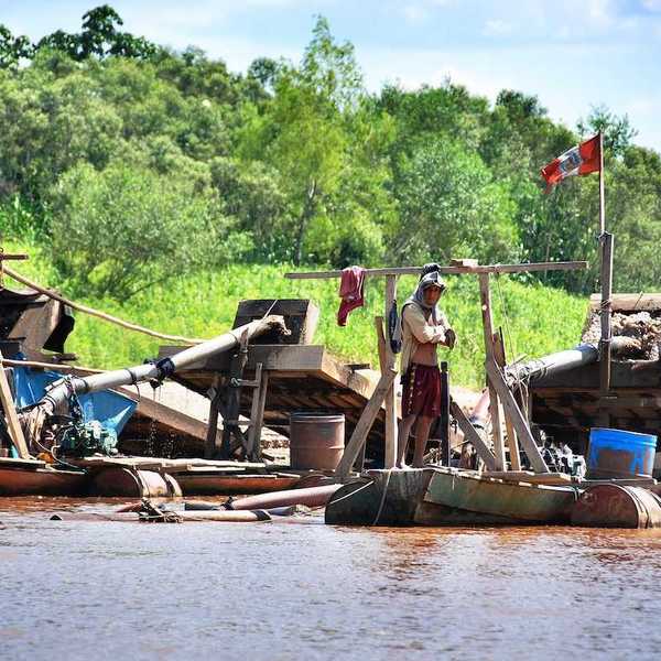 Illegal gold mining operation on the Madre de Dios river in Peru