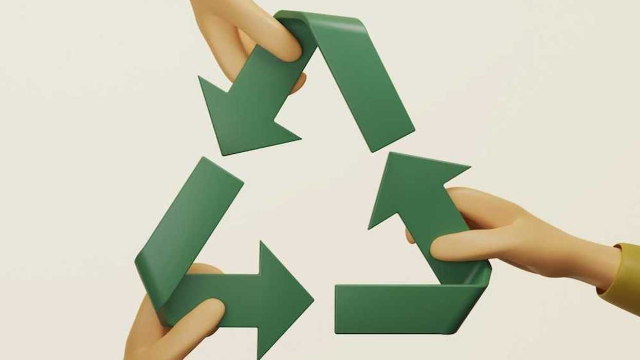 Illustration of three disembodied hands - each holding a piece of the universal recycling symbol