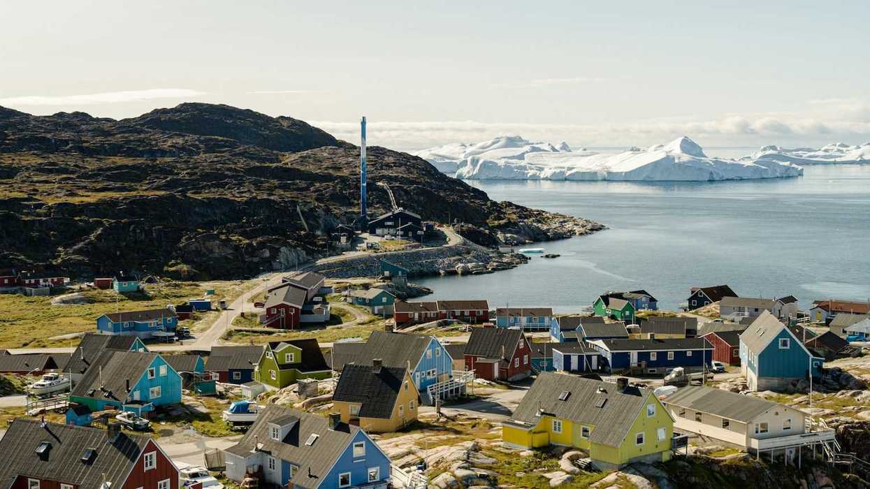 Ilulissat, Greenland - coastal village with icebergs floating in bay
