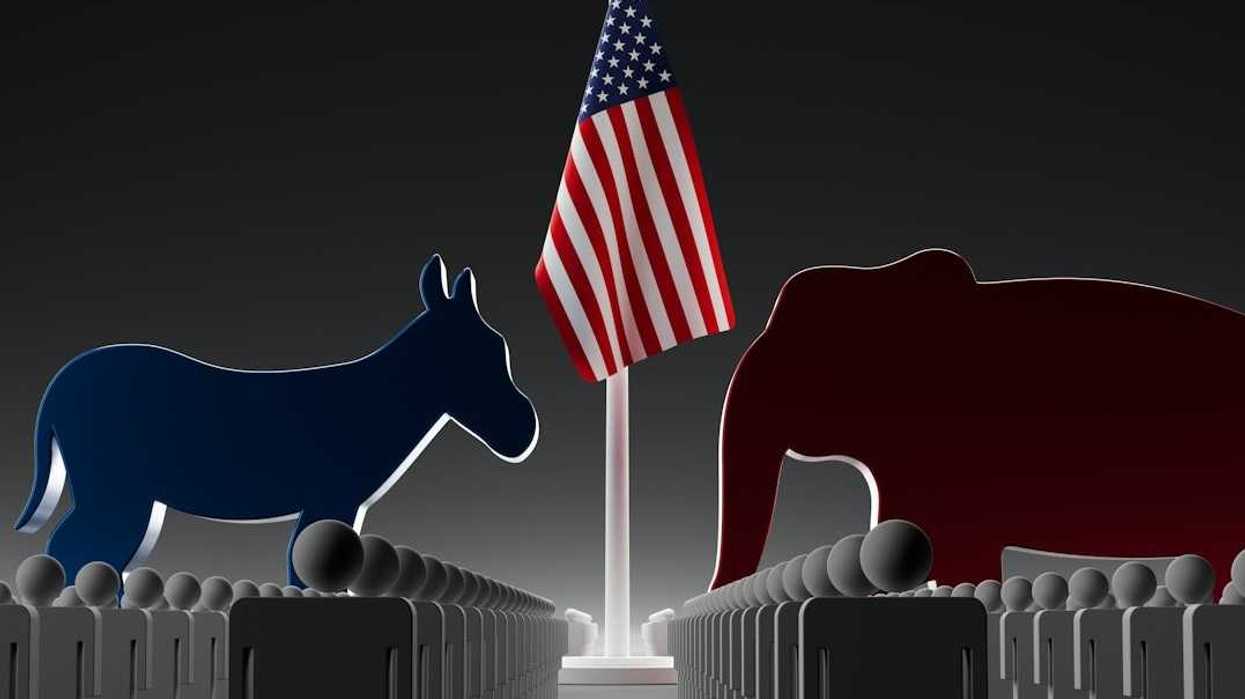 Image of a blue donkey facing off with a red elephant with an American flag in between