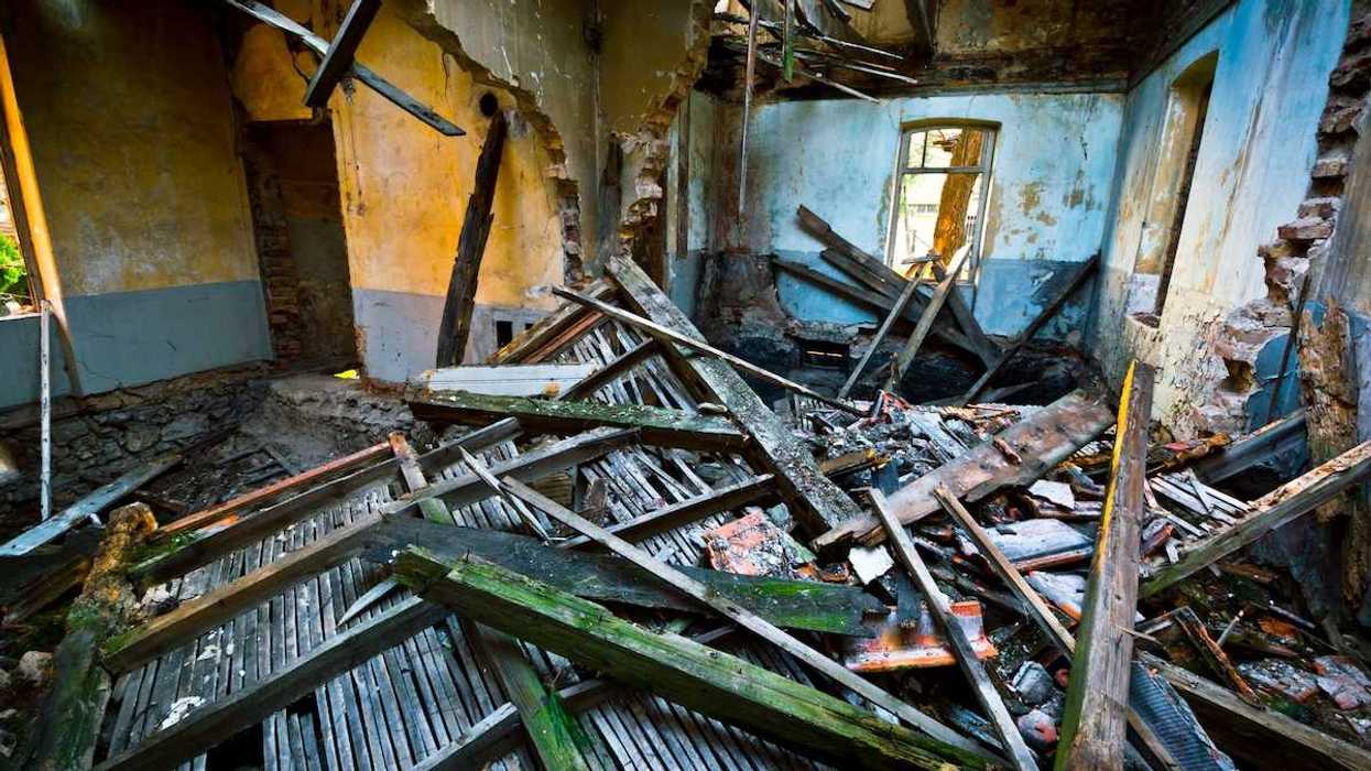 interior of partially collapsed and burned-out structure