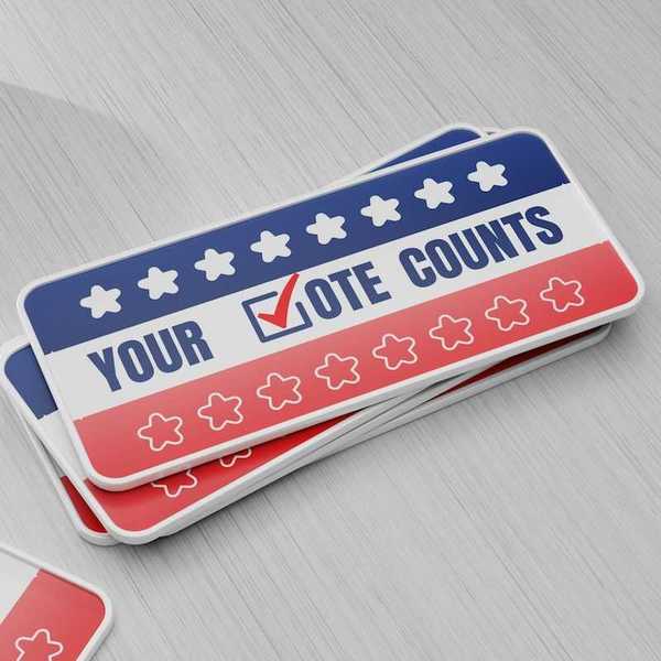 Items meant to encourage people to vote "YOUR √OTE COUNTS"