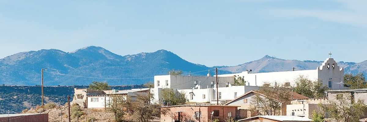 Laguna Pueblo, New Mexico with mountains in background.