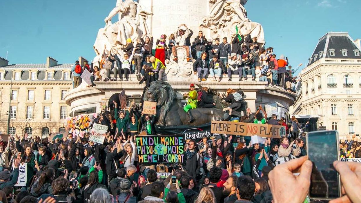 Large crowd gathered at the Place de la République, Paris, France for climate protest