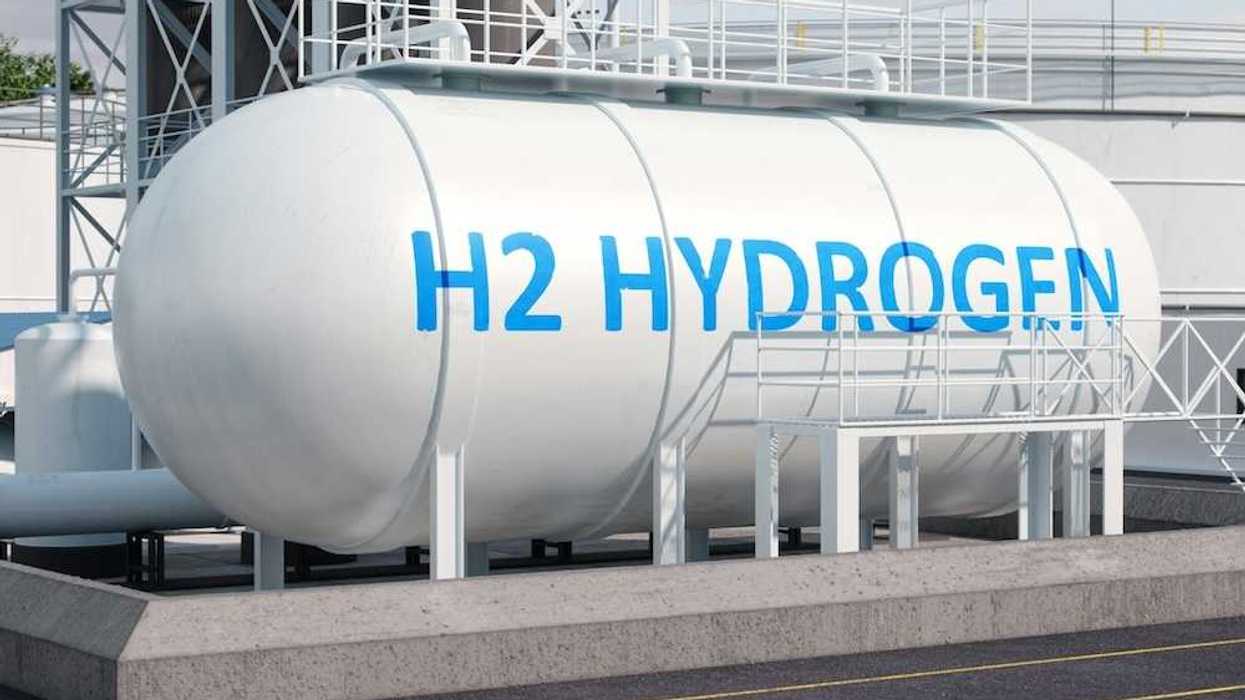 Large white storage tank with blue letters reading, "H2 HYDROGEN"