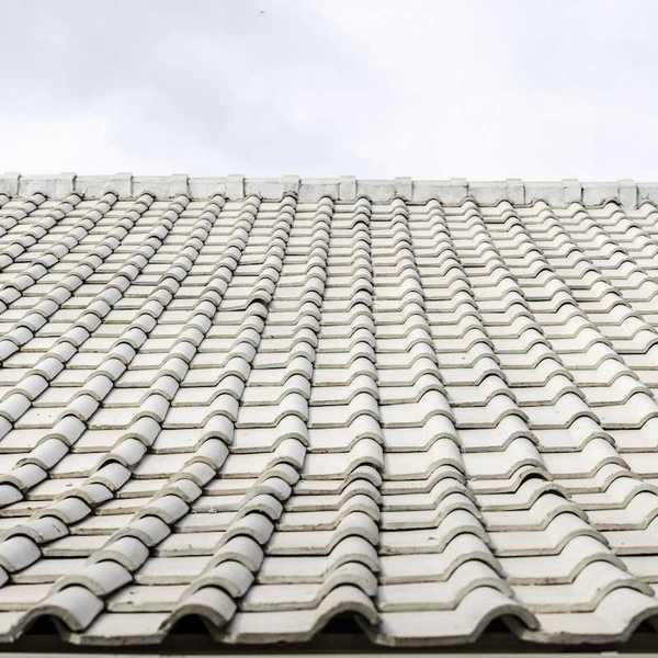 Light-colored clay or cement tile roof