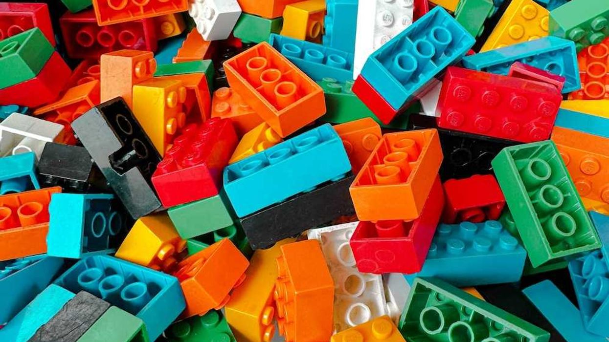loose pile of multicolored plastic Lego blocks