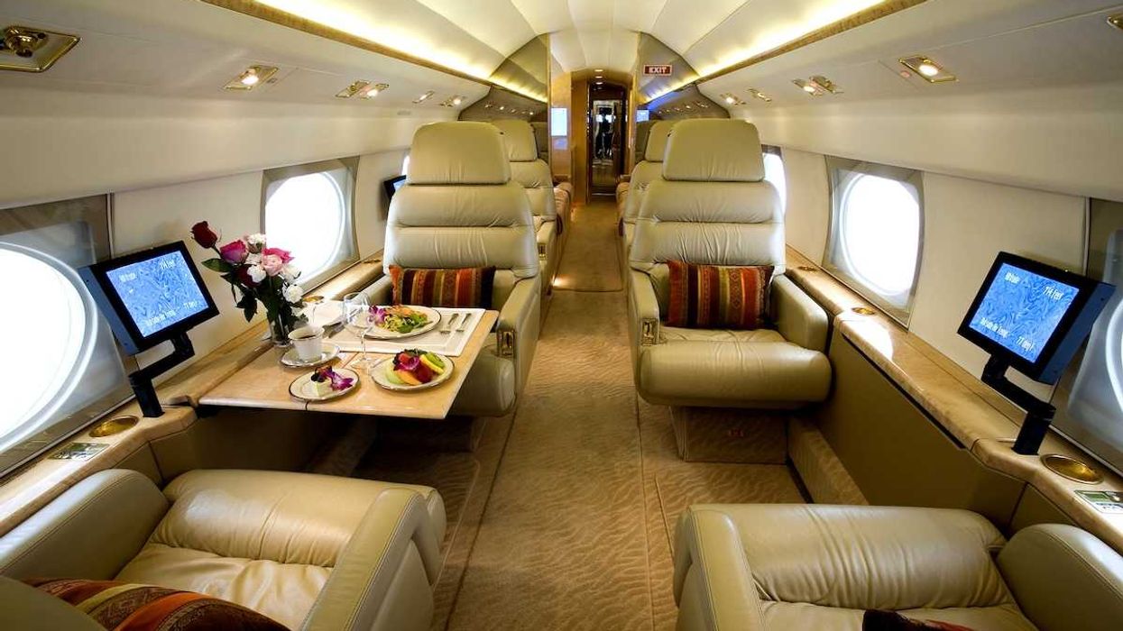 Luxury interior of a private gulfstream jet with large cabin aircraft