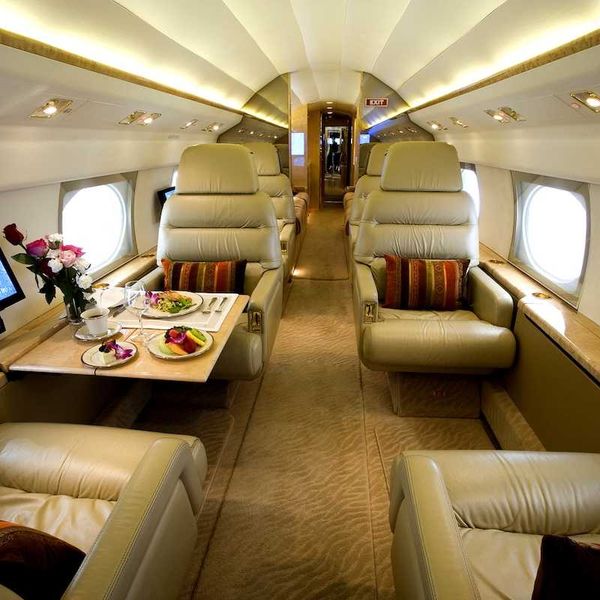 Luxury interior of a private gulfstream jet with large cabin aircraft