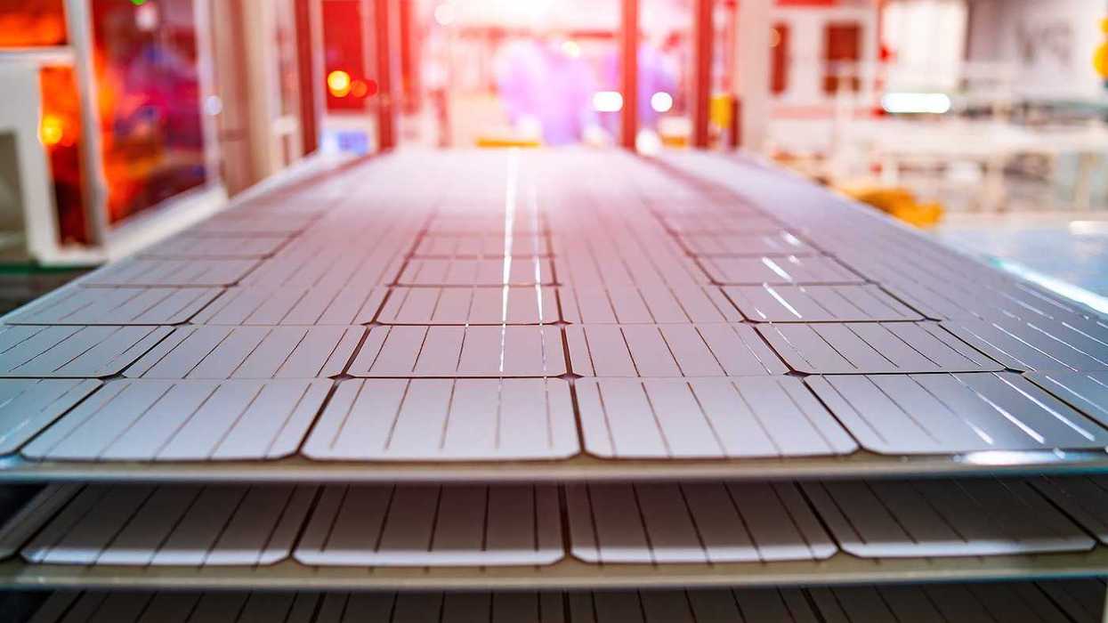 Manufacturing of solar panel system in factory.