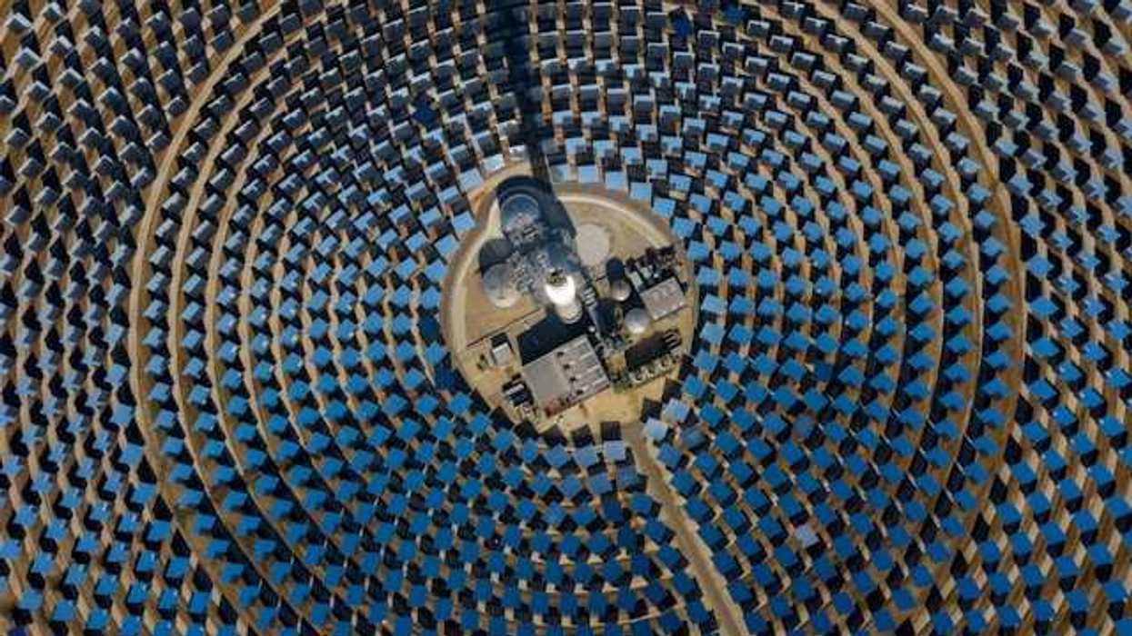 Many solar panels arranged in a circular pattern viewed from above