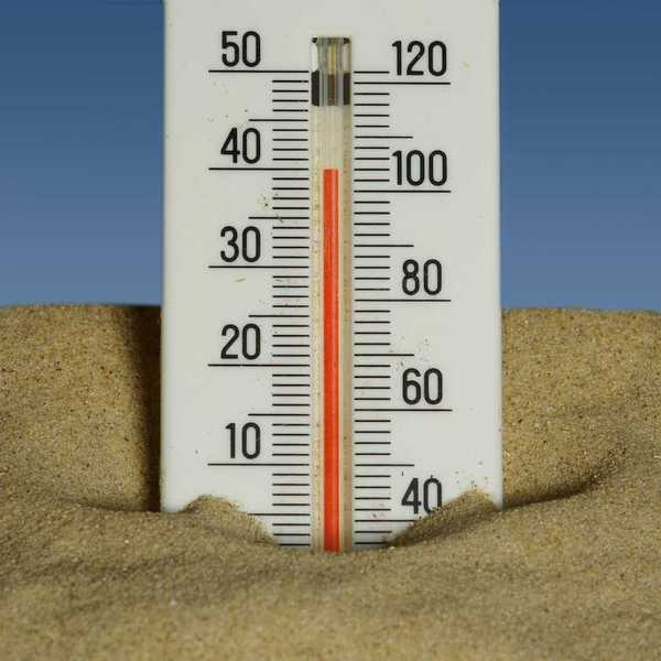 Mercury thermometer stuck in the sand and reading 40 degrees C/104 degrees F