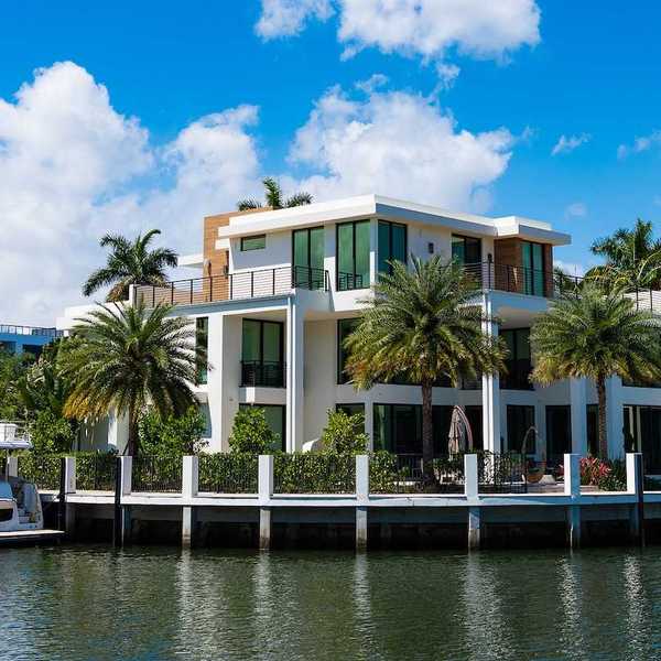 Modern luxury villa with private yacht