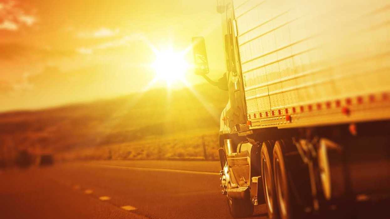Modern semi truck in motion on an American highway