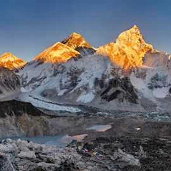 Mount Everest with sunshine on its peaks
